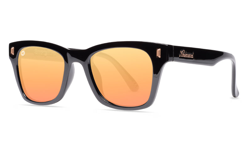 Sunglasses with Clear Black Frames and Polarized Peach Lenses, Threequarter