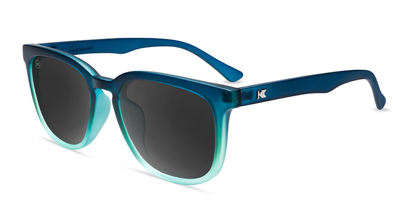 Sunglasses with Deep Blue to Light Blue Frames and Polarized Black Lenses, Flyover